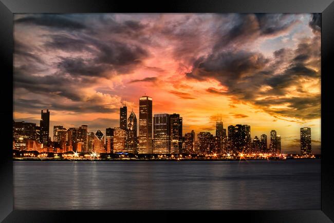Chicago skyline during an incoming storm with sunset  Framed Print by Thomas Baker