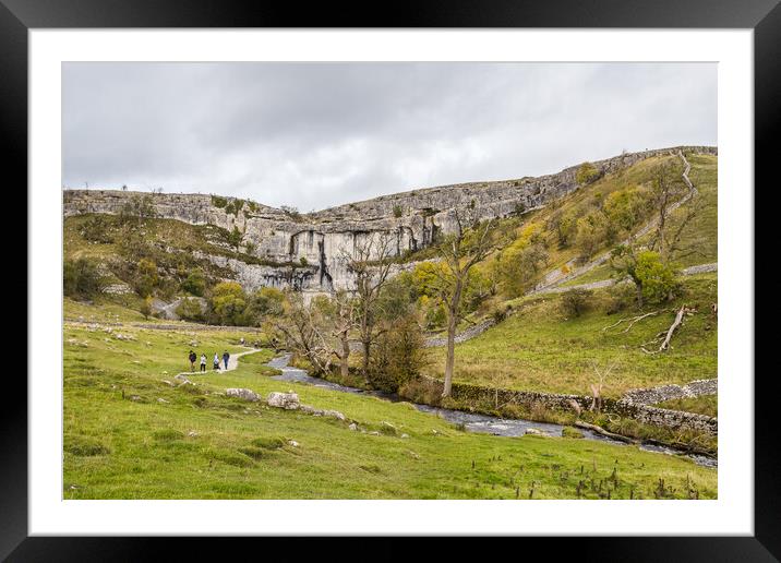 Tourists exploring Malham Cove Framed Mounted Print by Jason Wells