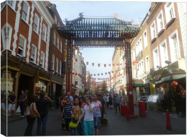 Bustling China Town in London Canvas Print by Simon Hill