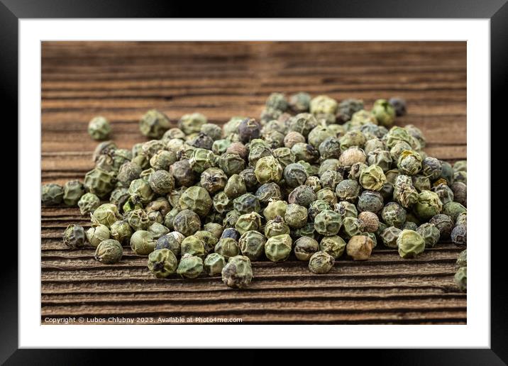 Dried spices green pepper on a wooden board Framed Mounted Print by Lubos Chlubny