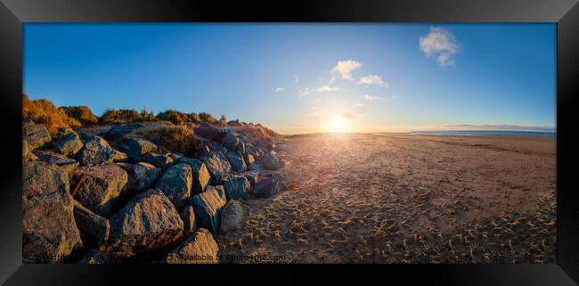 North Norfolk beach sunset and rocks Framed Print by Simon Bratt LRPS