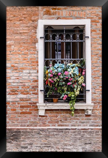 Flowers In A Window Overlooking One The Back Stree Framed Print by Peter Greenway