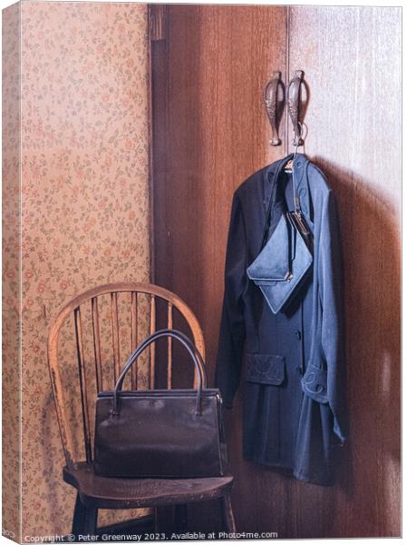 Vintage 1950s' Clothes Hung Up On A Hanger On A Wardrobe Canvas Print by Peter Greenway