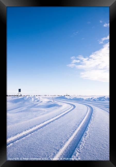Vehicle Tyre Tracks In The Snow Around Utsjoki, Finland Framed Print by Peter Greenway
