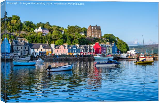 Boats in the harbour, Tobermory waterfront Canvas Print by Angus McComiskey