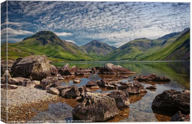 Rocks on the shore of wast Water Cumbria UK Canvas Print by John Gilham