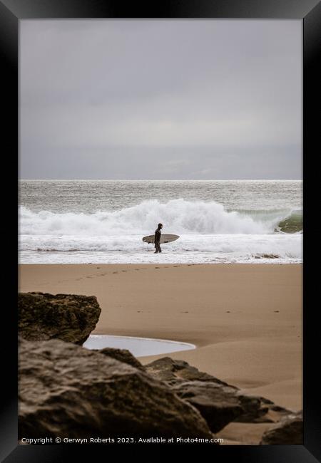 Surfer at Porth Ceiriad, Wales Framed Print by Gerwyn Roberts