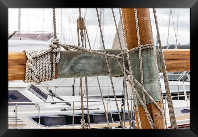 Sailboat mast and rigging with sail ropes and line Framed Print by MallorcaScape Images