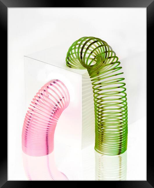 Slinky Set Framed Print by Kelly Bailey