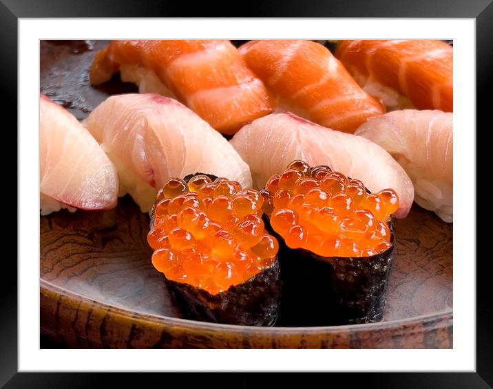 Close up of sushi salmon fish eggs with yellow tail and salmon p Framed Mounted Print by Thomas Baker