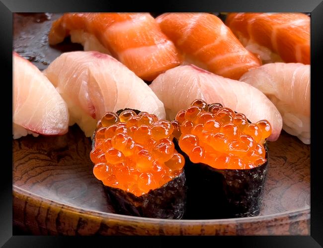 Close up of sushi salmon fish eggs with yellow tail and salmon p Framed Print by Thomas Baker