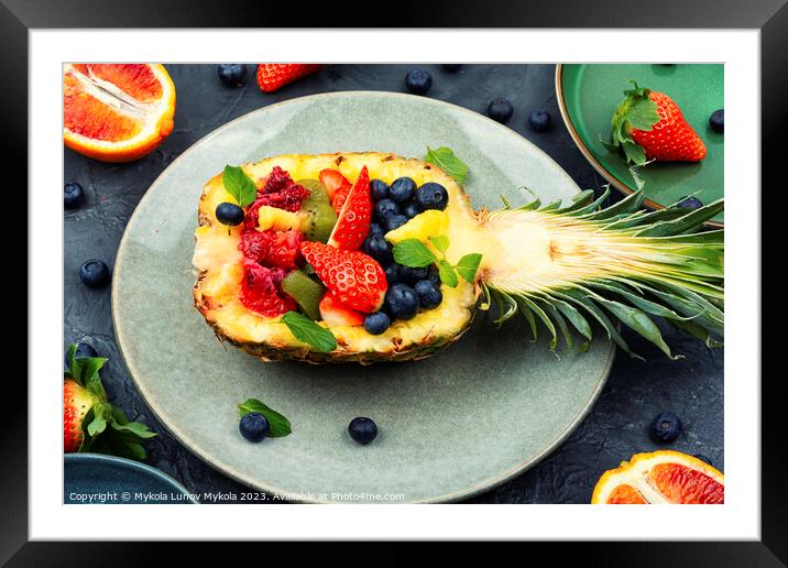 Fruit salad in half a pineapple, vegan concept. Framed Mounted Print by Mykola Lunov Mykola