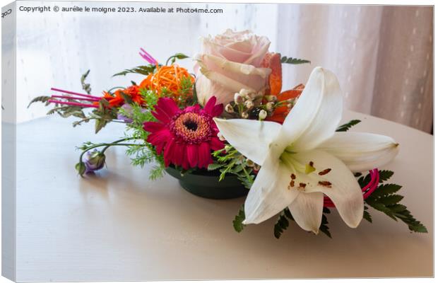 Flowers arrangement in a plastic bowl Canvas Print by aurélie le moigne