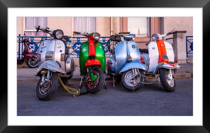 Vespa and Lambretta scooters at Whitby Framed Mounted Print by Tim Hill