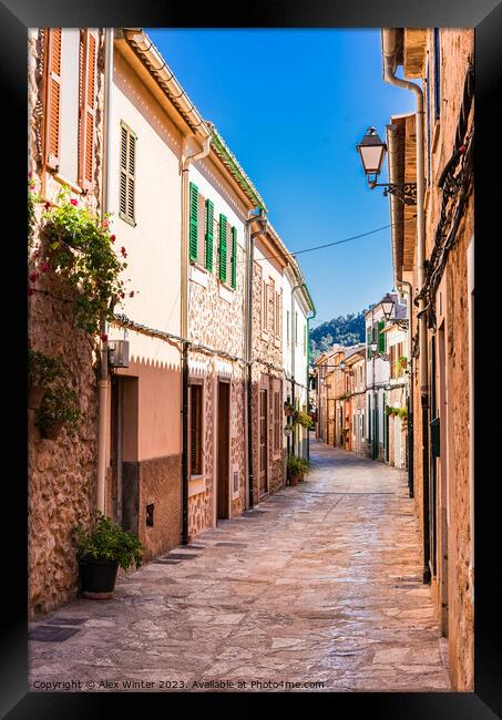 Empty street in the small town of Esporles Framed Print by Alex Winter