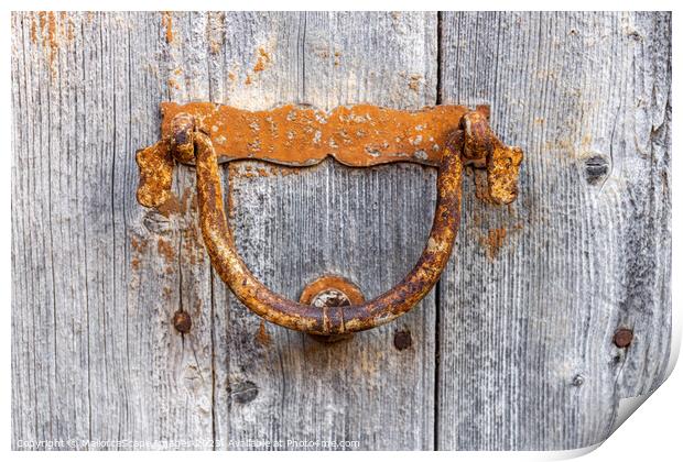 Old door knocker on a wooden door Print by MallorcaScape Images