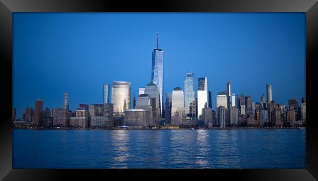 Evening view over the skyline of Manhattan - travel photography Framed Print by Erik Lattwein