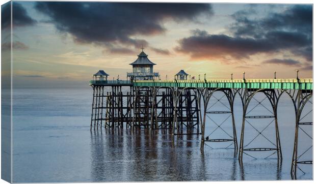 Clevedon Pier with a Moody Sunset Sky Canvas Print by Tracey Turner