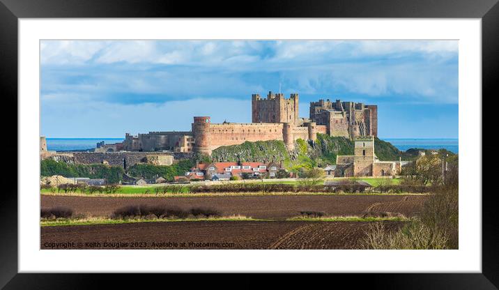 Bamburgh Castle and St Aidans Church Framed Mounted Print by Keith Douglas