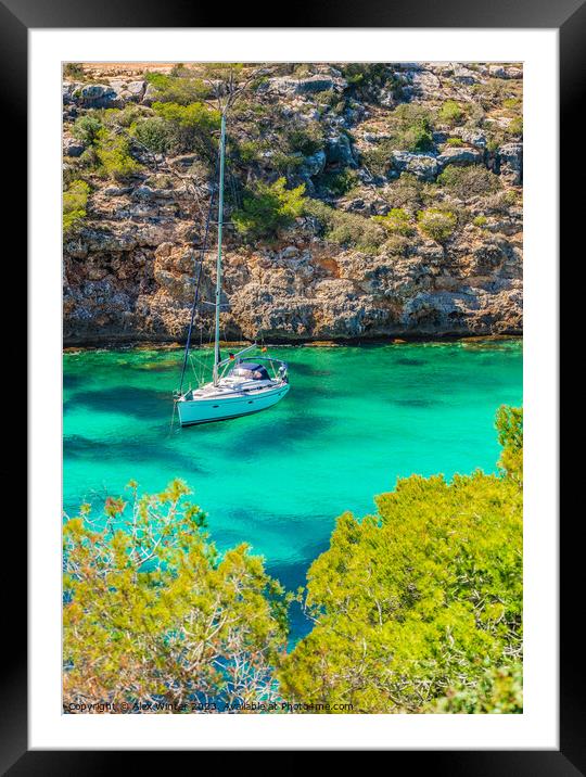 Beautiful bay with anchoring sailboat yacht Framed Mounted Print by Alex Winter