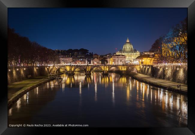 Sant Angelo bridge and St. Peter's cathedral in Rome Framed Print by Paulo Rocha