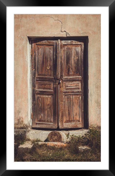 Old shabby faded wooden doors  Framed Mounted Print by Lana Topoleva