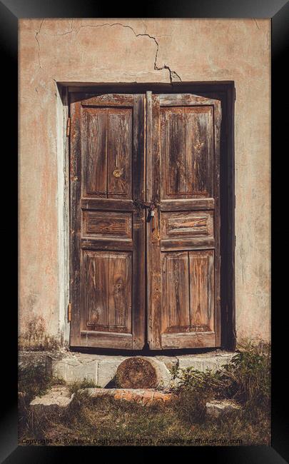 Old shabby faded wooden doors  Framed Print by Lana Topoleva