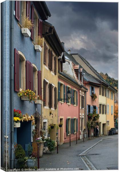 Colorful Backstreet, Thann, France Canvas Print by Imladris 