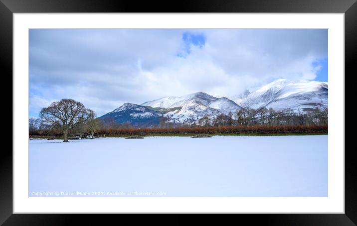 Snow covered field and hills Framed Mounted Print by Darrell Evans
