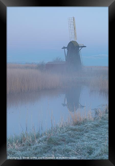 Herringfleet wind pump in the mist Framed Print by Derek Griffin