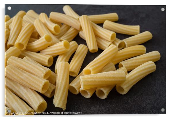 Raw italian penne rigate pasta isolated on black background Acrylic by Lubos Chlubny