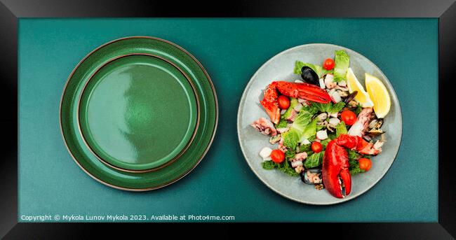 Seafood salad on a plate Framed Print by Mykola Lunov Mykola