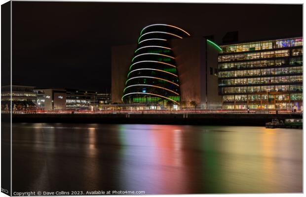 The lights of the Dublin Convention Centre reflected in the river Liffey at night Canvas Print by Dave Collins
