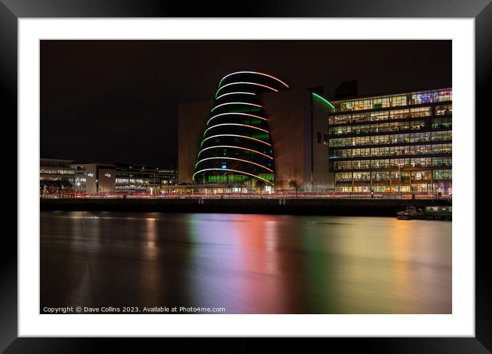 The lights of the Dublin Convention Centre reflected in the river Liffey at night Framed Mounted Print by Dave Collins