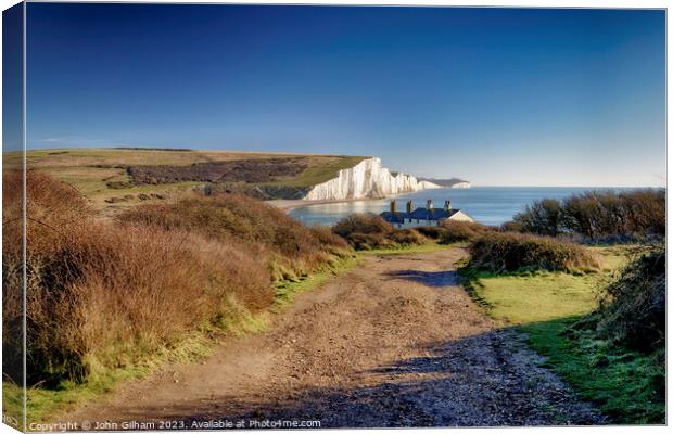 View of Seven Sisters Chalk Cliffs and Coastguard Cottages at Cuckmere Haven Sussex Canvas Print by John Gilham