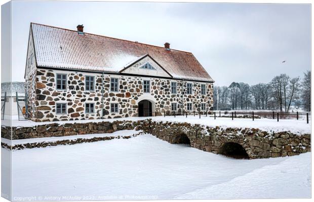 Hovdala Castle in a Winter Wonderland Canvas Print by Antony McAulay