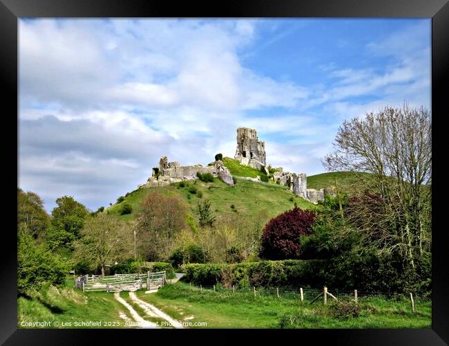 Majestic Ruins of Corfe Castle Framed Print by Les Schofield