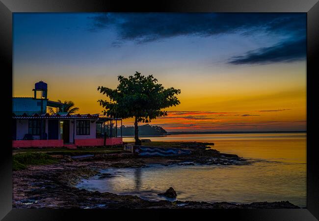 Golden Hour At Playa Larga Framed Print by Chris Lord