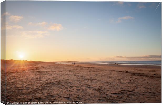 Brancaster Beach North Norfolk at sunset Canvas Print by Simon Bratt LRPS