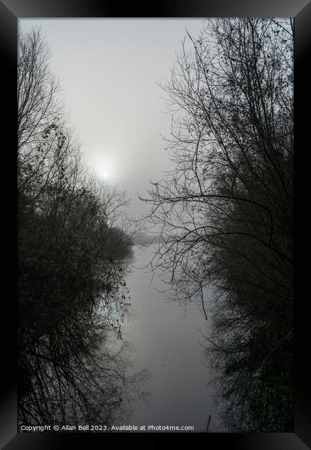 Misty sun over lake in Monochrome Framed Print by Allan Bell