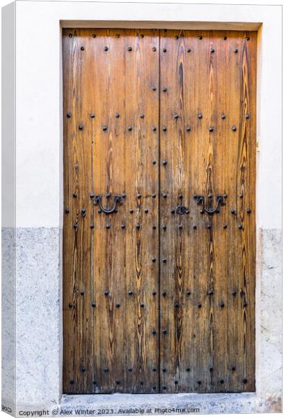 Old wooden front door Canvas Print by Alex Winter