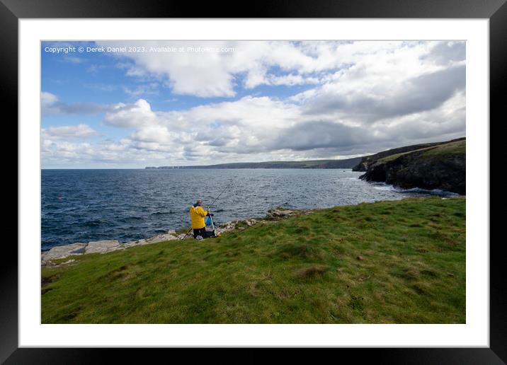 A Serene Fishing Spot on Cornwalls Rugged Headland Framed Mounted Print by Derek Daniel