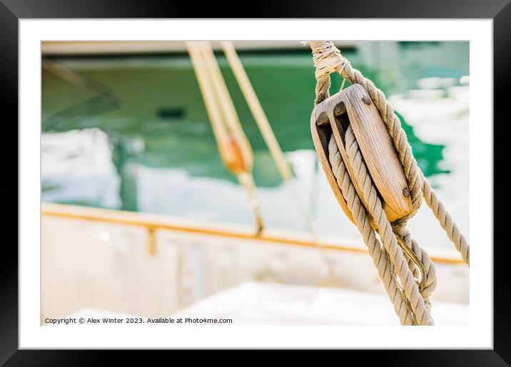 Rustic Charm of a Wooden Sailboat Pulley Framed Mounted Print by Alex Winter