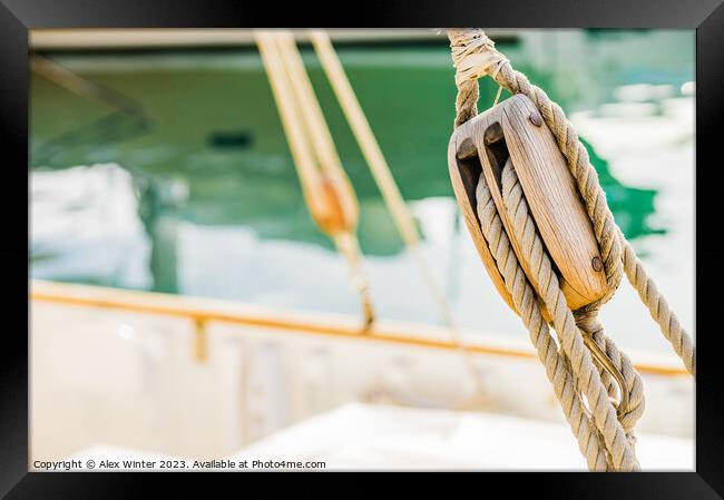 Rustic Charm of a Wooden Sailboat Pulley Framed Print by Alex Winter
