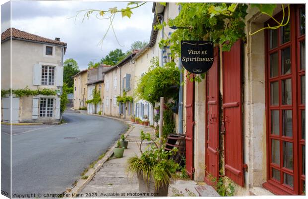 Street view in Verteuil-sur-Charente, Charente, Poitou-Charente, France Canvas Print by Chris Mann