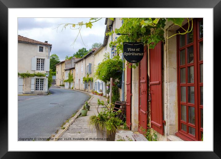 Street view in Verteuil-sur-Charente, Charente, Poitou-Charente, France Framed Mounted Print by Chris Mann