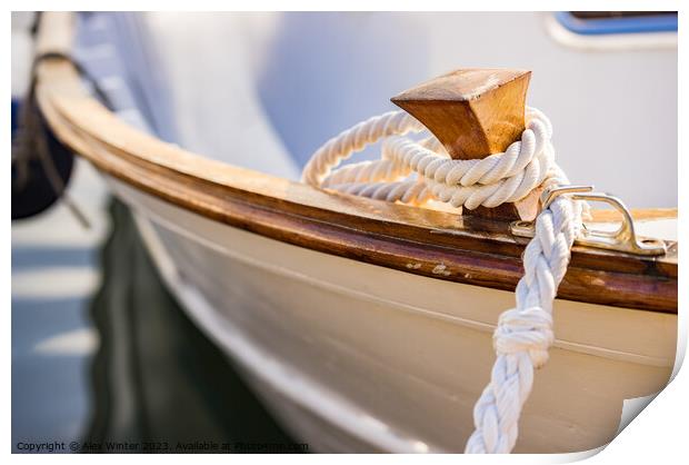 White mooring rope is knotted on boat cleat Print by Alex Winter