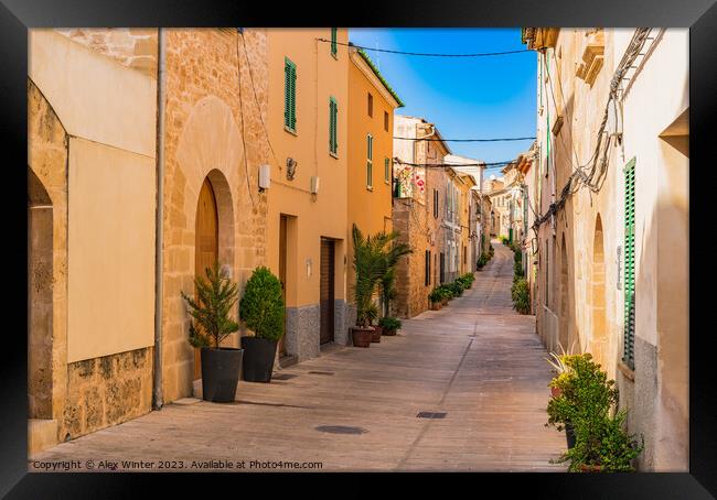 Street in the old town of Alcudia Framed Print by Alex Winter