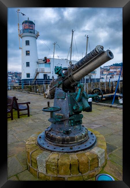 Scarborough Lighthouse And Gun Framed Print by Steve Smith