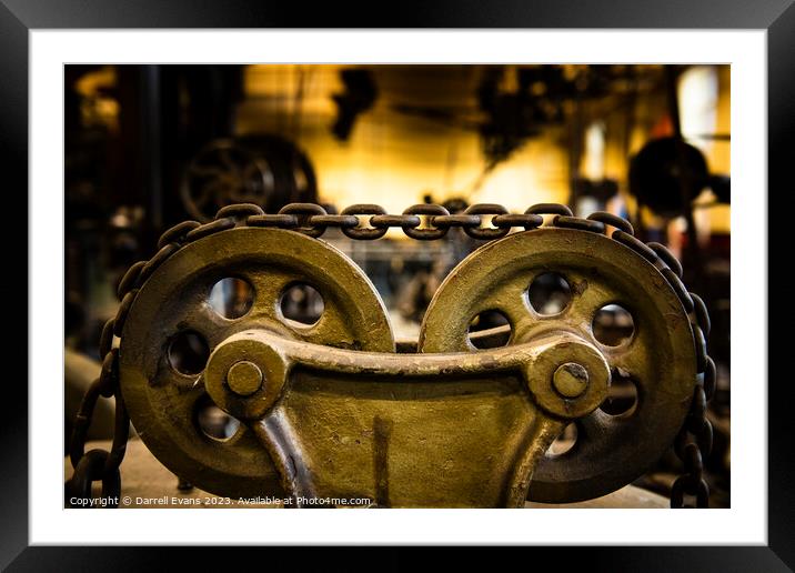 Wheels and Chain Framed Mounted Print by Darrell Evans